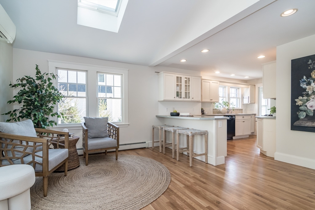 11 Durant Road Wellesley, MA 02482 - Photo 11 of 28 a living room with furniture and a kitchen