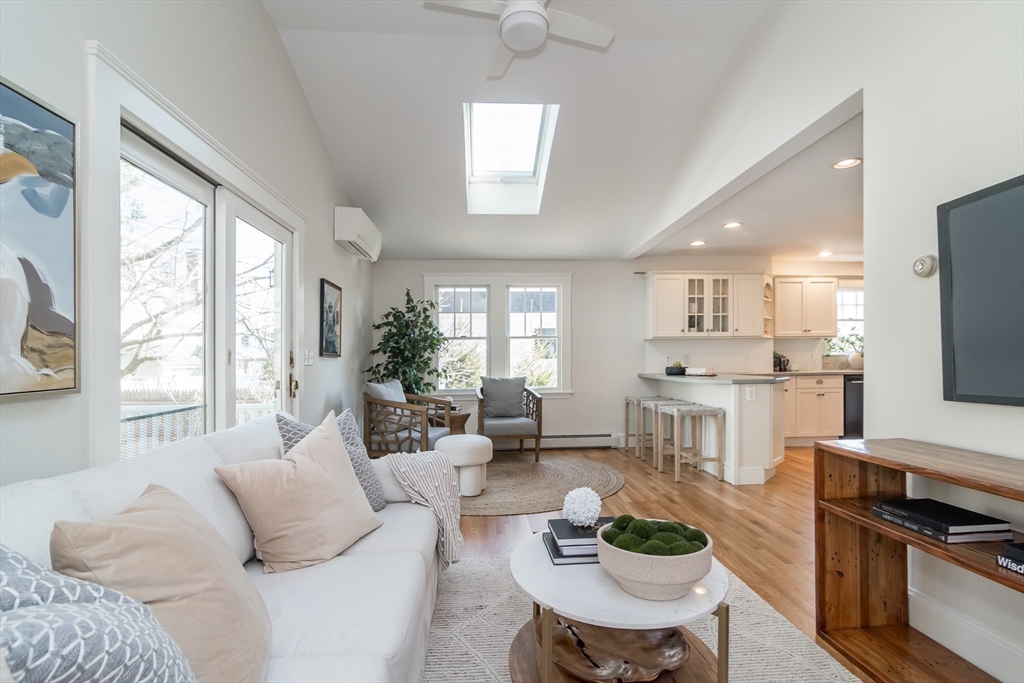 11 Durant Road Wellesley, MA 02482 - Photo 12 of 28 a living room with furniture and a large window