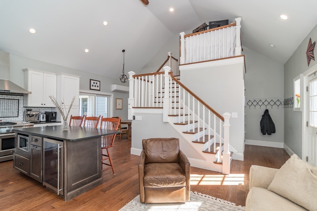 11 Durant Road Wellesley, MA 02482 - Photo 20 of 28 a living room with furniture and a chandelier