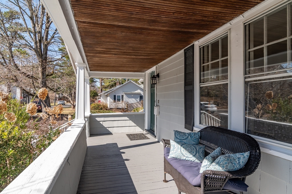 11 Durant Road Wellesley, MA 02482 - Photo 3 of 28 a balcony with furniture and a potted plant