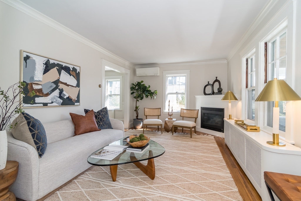 11 Durant Road Wellesley, MA 02482 - Photo 4 of 28 a living room with furniture a rug and a fireplace