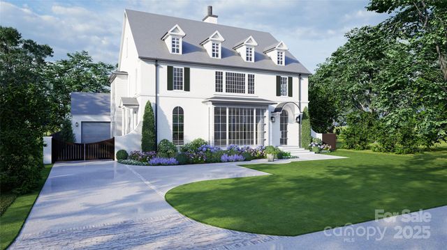 front view of a house with a garden