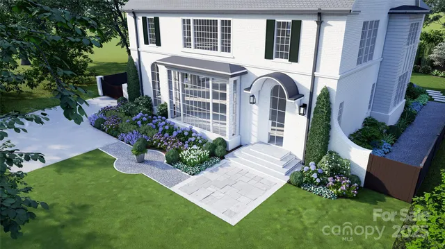 a view of a house with a garden and pathway