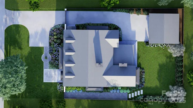 an aerial view of a house with garden space and street view