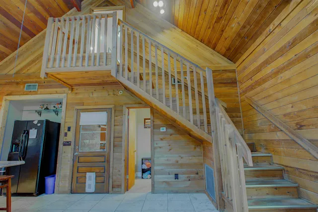 a kitchen with sink and window