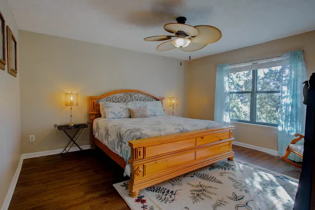 a bathroom with a toilet a sink and a mirror