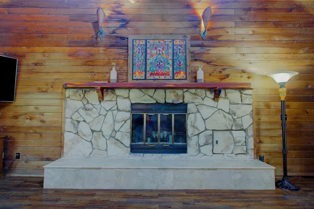 a view of entrance with a brick wall