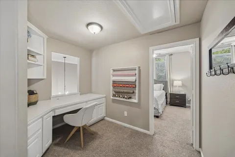 a workspace with furniture and closet