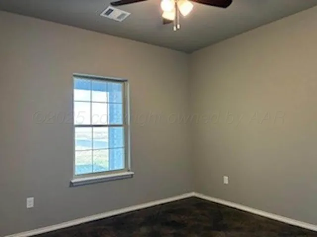 a bathroom with a granite countertop sink toilet and bathtub