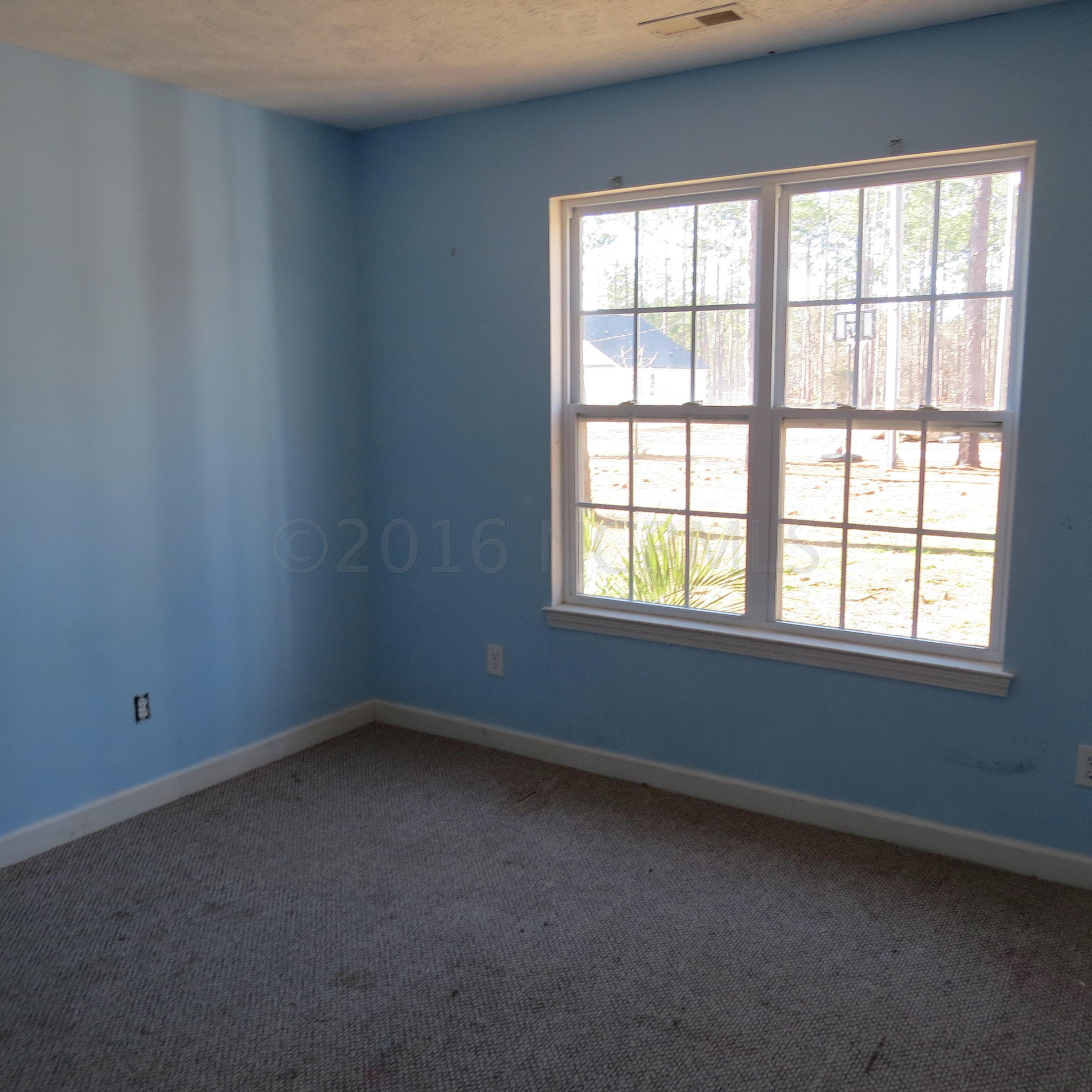 1890 Pinehurst Road Southport, NC 28461 - Photo 12 of 22 Third Bedroom