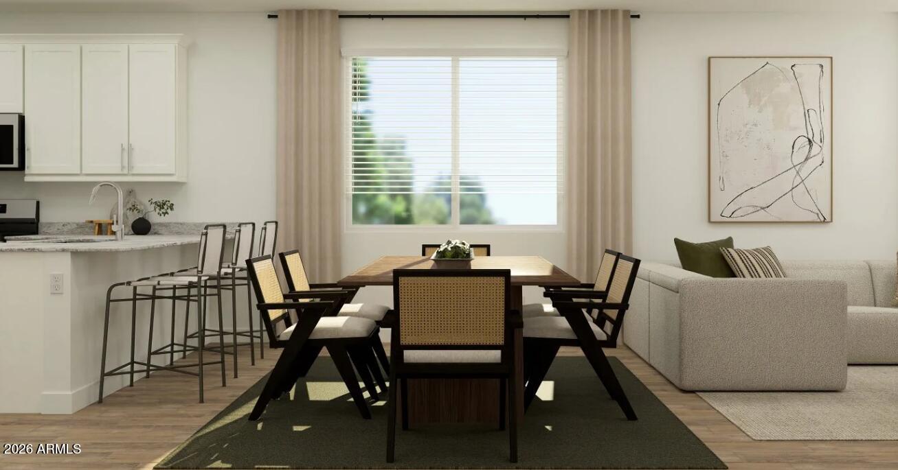 2168 Rutledge Avenue Apache Junction, AZ 85120 - Photo 4 of 16 a dining room with furniture and window