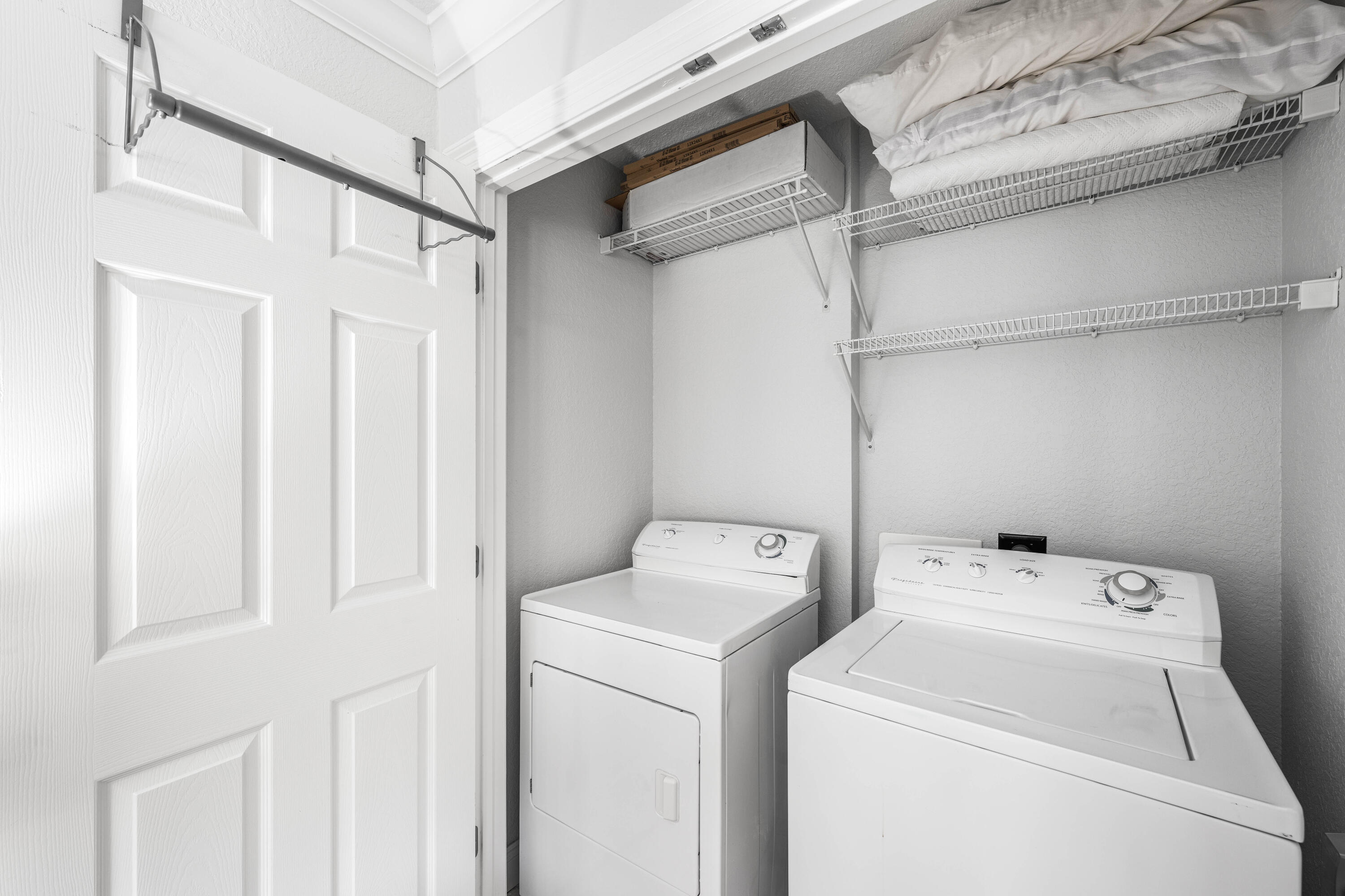 33 Dune Breeze Lane, Unit H2 Santa Rosa Beach, FL 32459 - Photo 46 of 54 a utility room with dryer and washer