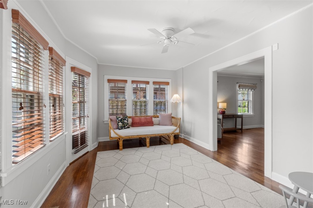 3124 Warrington Road Cleveland, OH 44120 - Photo 7 of 36 Sitting room featuring baseboards, wood finished floors, and ceiling fan