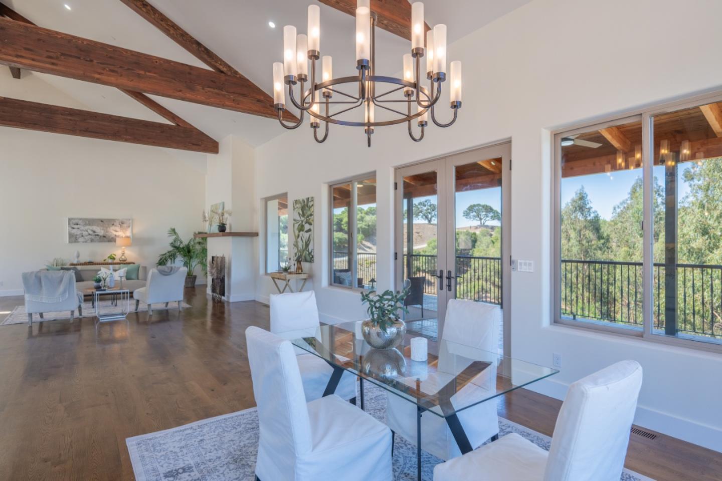 9020 Hidden Canyon Road Salinas, CA 93907 - Photo 25 of 58 a view of a dining room with furniture wooden floor and chandelier