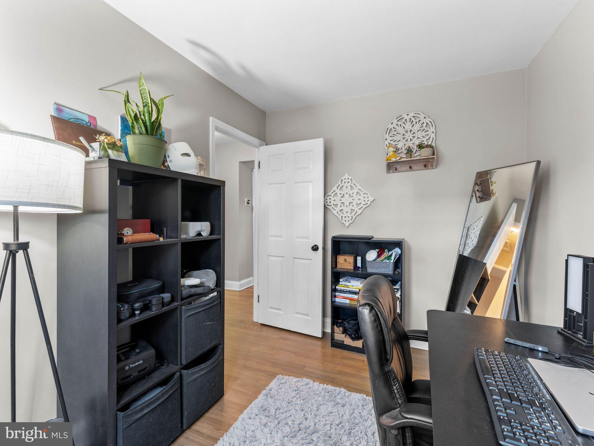 108 Estates Road Pine Hill, NJ 08021 - Photo 18 of 30 a view of walk in closet with clothes and shoes