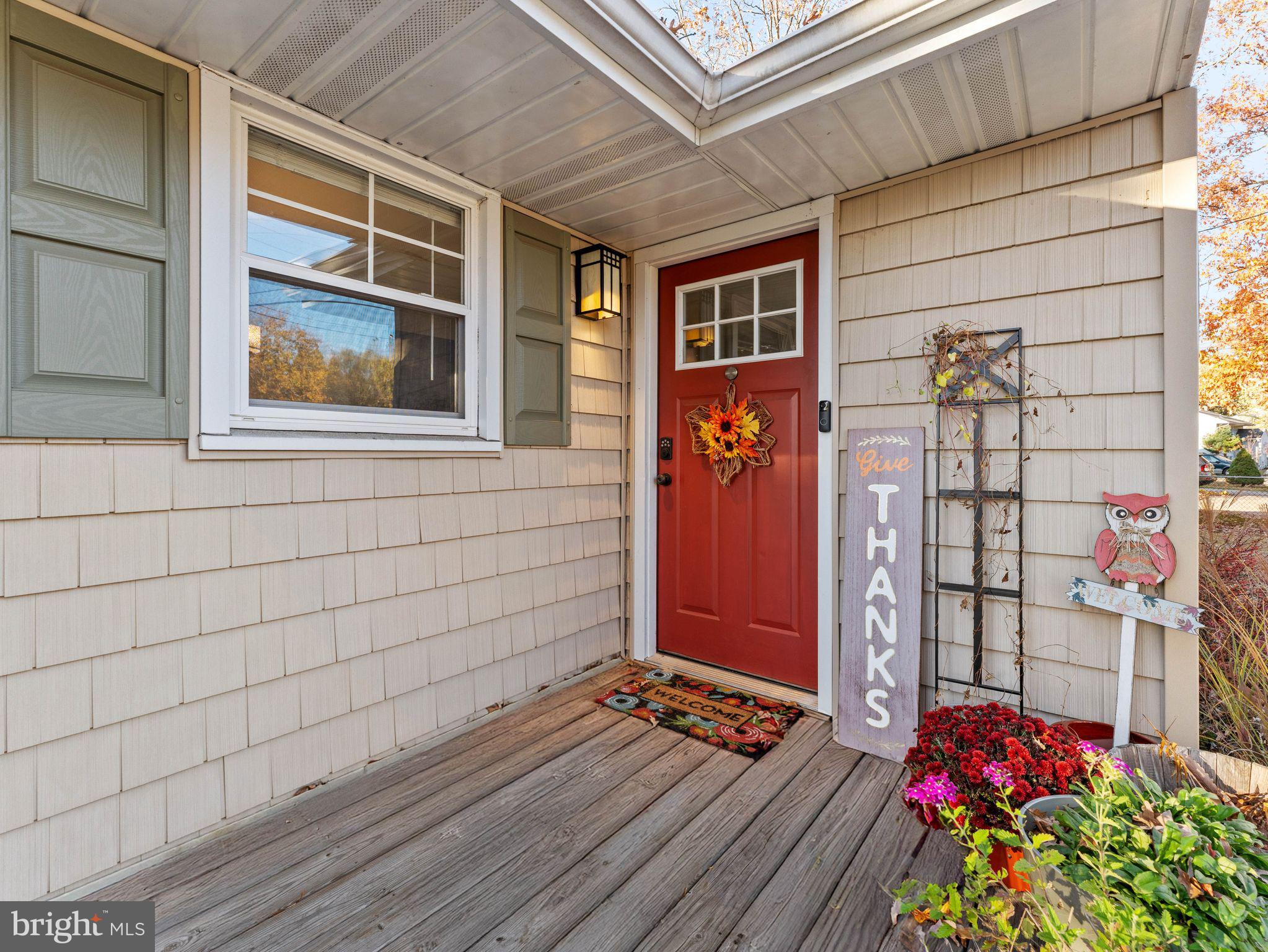108 Estates Road Pine Hill, NJ 08021 - Photo 2 of 30 a view of an entryway with wooden door