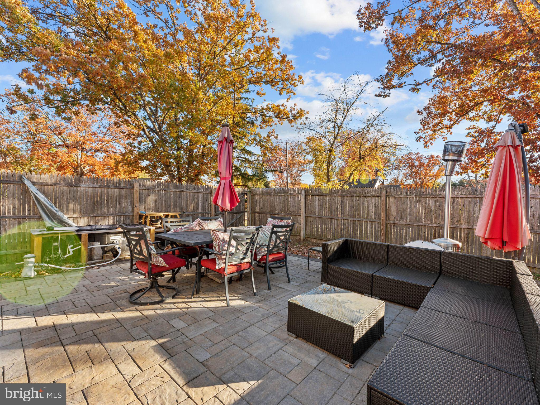 108 Estates Road Pine Hill, NJ 08021 - Photo 25 of 30 a backyard of a house with table and chairs