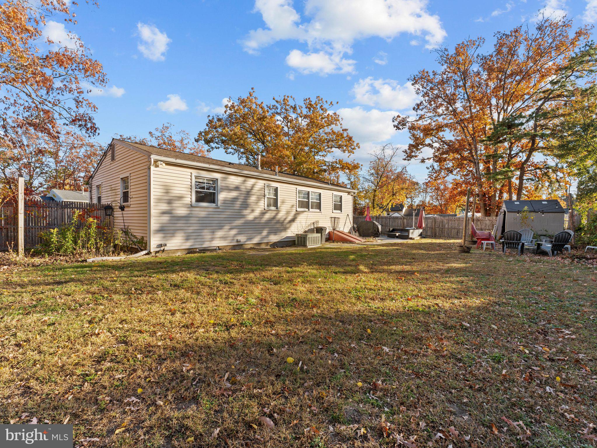 108 Estates Road Pine Hill, NJ 08021 - Photo 27 of 30 a view of a house with a yard