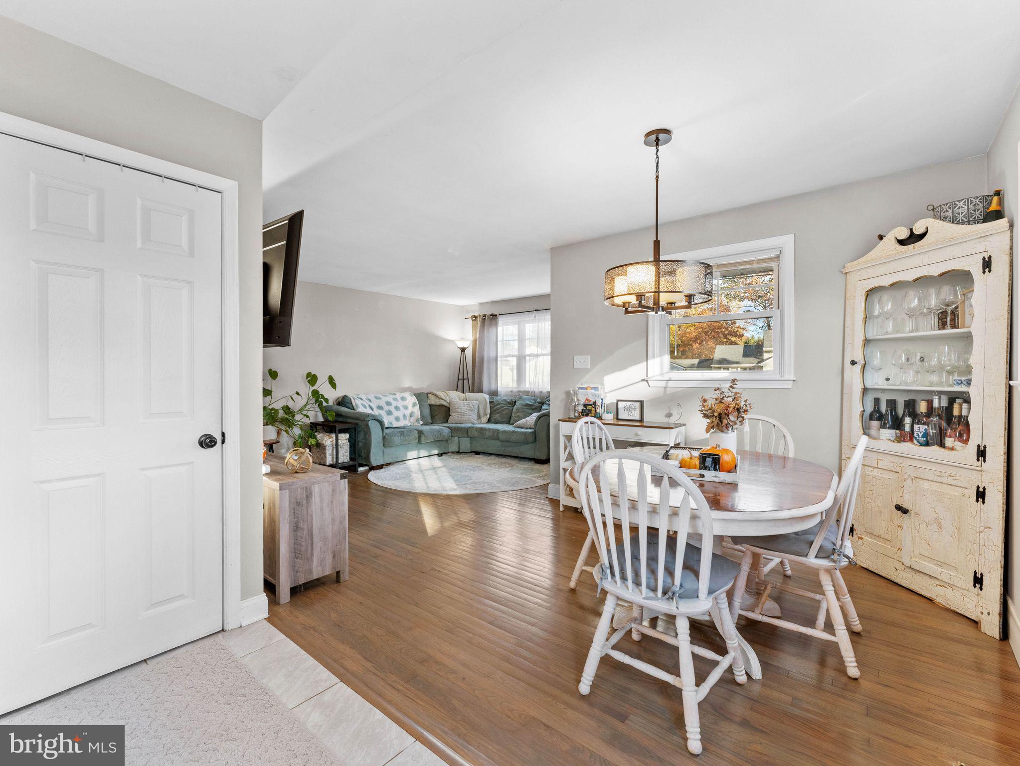 108 Estates Road Pine Hill, NJ 08021 - Photo 6 of 30 a dining room with furniture window and wooden floor