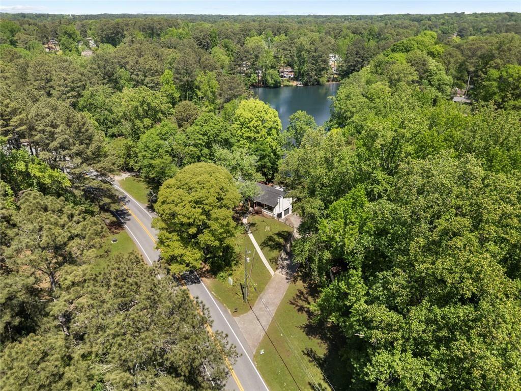 2702 Davenport Road Northwest Duluth, GA 30096 - Photo 46 of 48 an aerial view of residential houses with outdoor space and trees