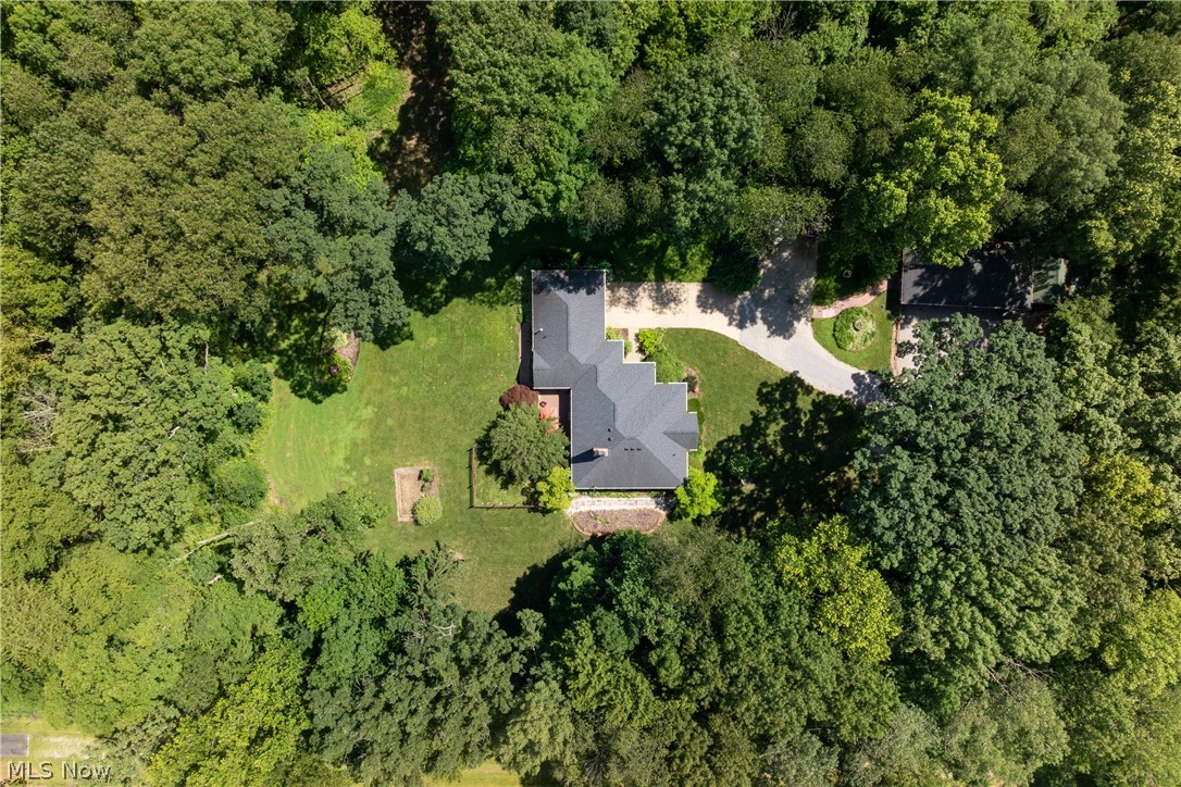 10400 Stoneacre Road Northwest Canal Fulton, OH 44614 - Photo 40 of 44 Aerial overview of property's location featuring a heavily wooded area