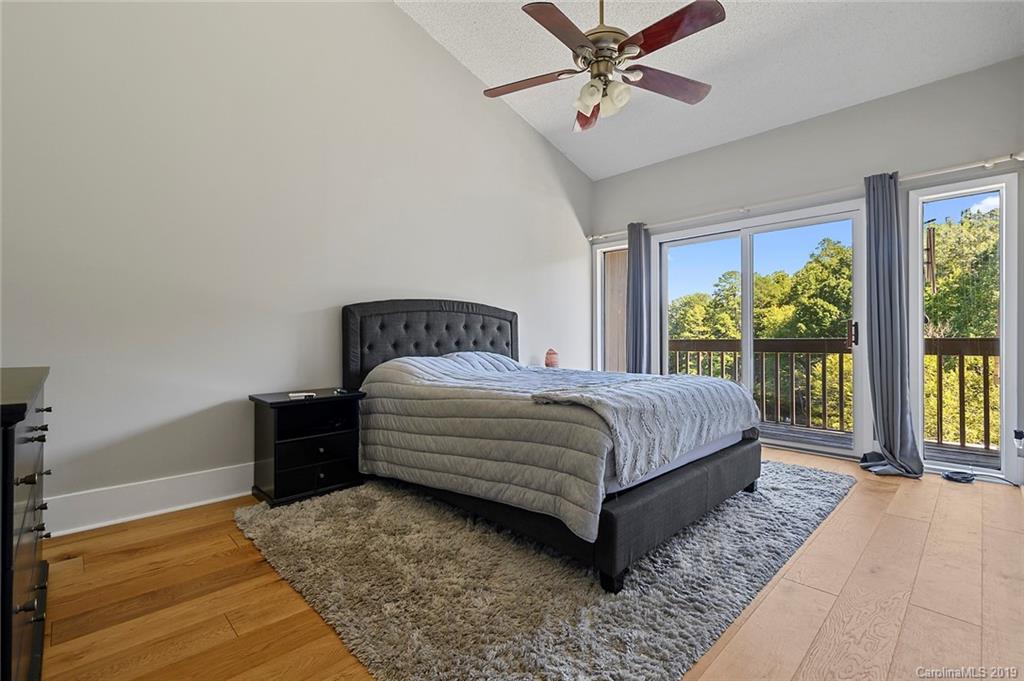 53 Old Post Road Lake Wylie, SC 29710 - Photo 15 of 36 a bedroom with a large bed and a window