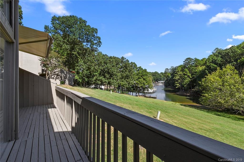 53 Old Post Road Lake Wylie, SC 29710 - Photo 30 of 36 a balcony with wooden floor and yard in the back