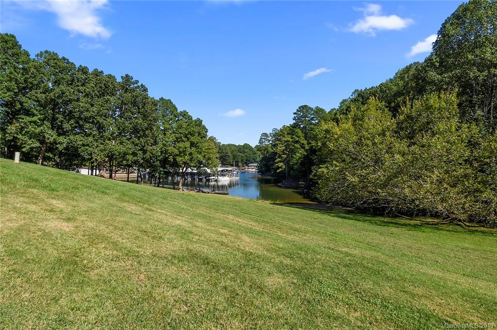 53 Old Post Road Lake Wylie, SC 29710 - Photo 31 of 36 a view of a field of grass and trees