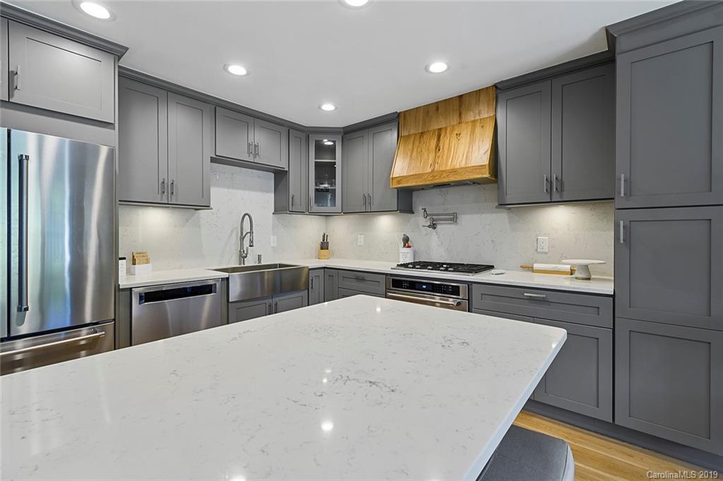 53 Old Post Road Lake Wylie, SC 29710 - Photo 5 of 36 a kitchen with stainless steel appliances granite countertop a sink stove and refrigerator