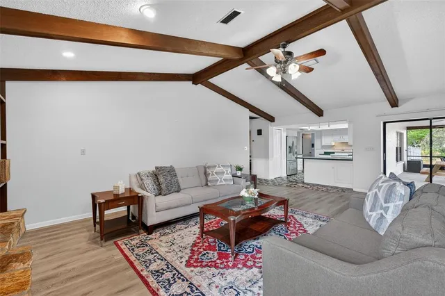 a kitchen with a sink and a large window