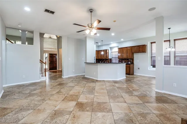 a view of a kitchen with a sink and a microwave
