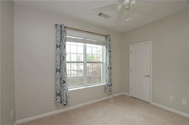 a bathroom with a sink a mirror and a shower