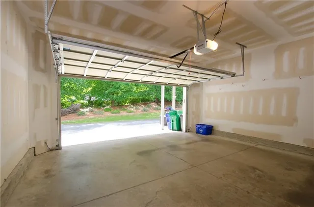 a bathroom with a bathtub and a window