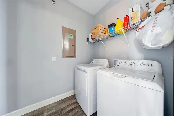 a utility room with dryer and washer
