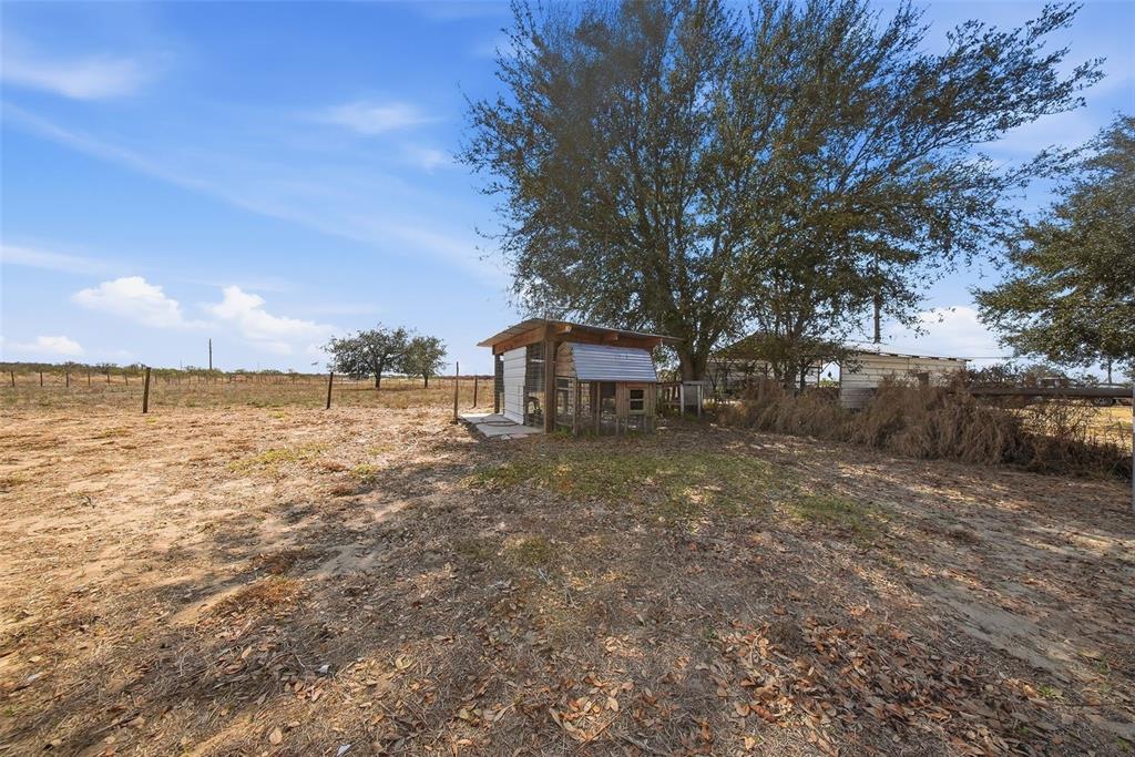 3090 80 Foot Road Bartow, FL 33830 - Photo 36 of 48 a backyard of a house with lots of green space