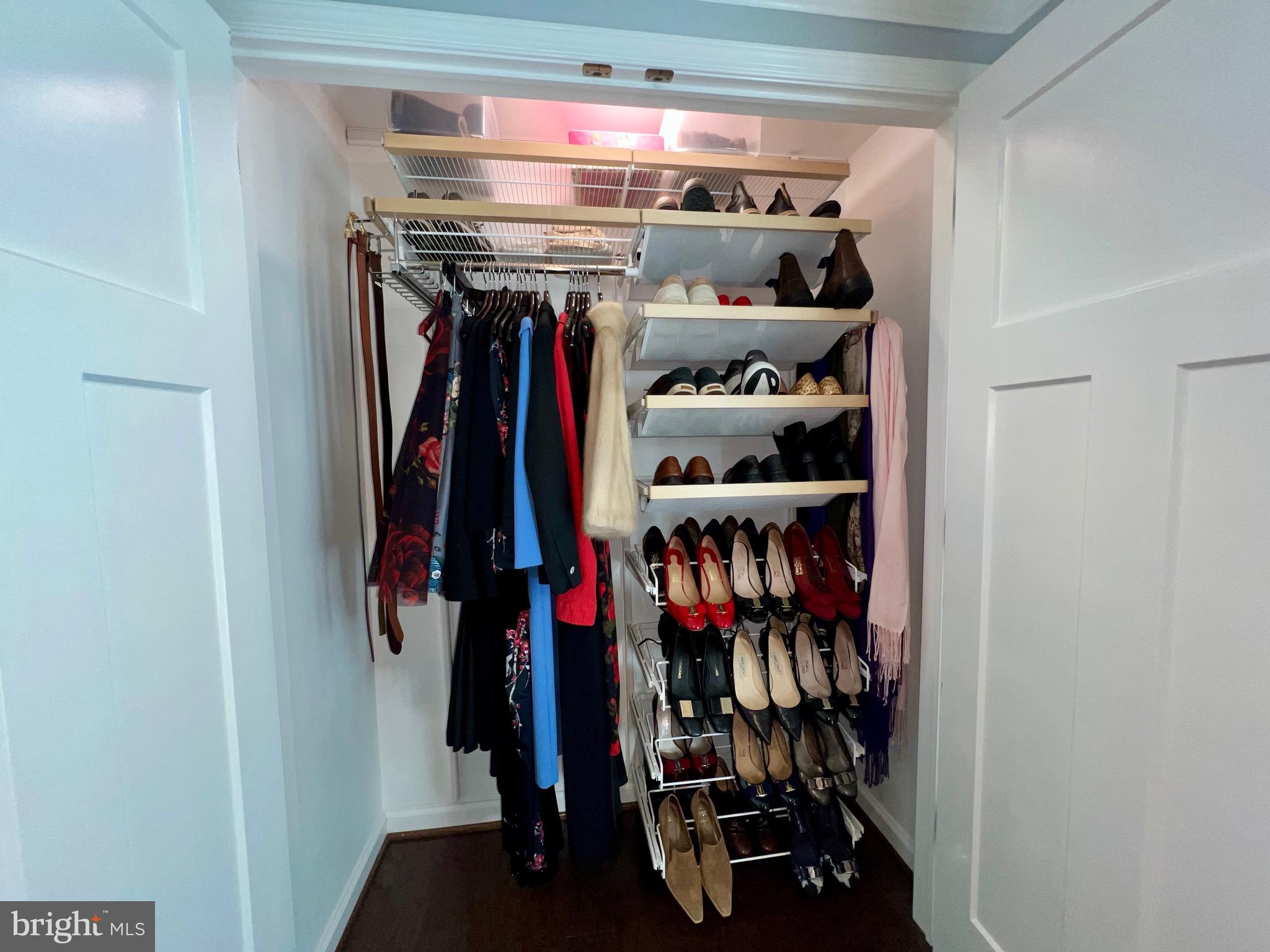 909 St Stephens Road Alexandria, VA 22304 - Photo 17 of 40 a view of walk in closet with clothes
