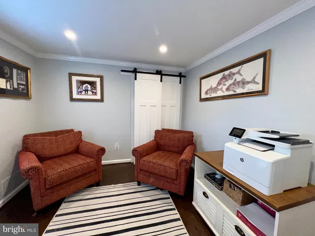 a bathroom with a tub sink shower and mirror