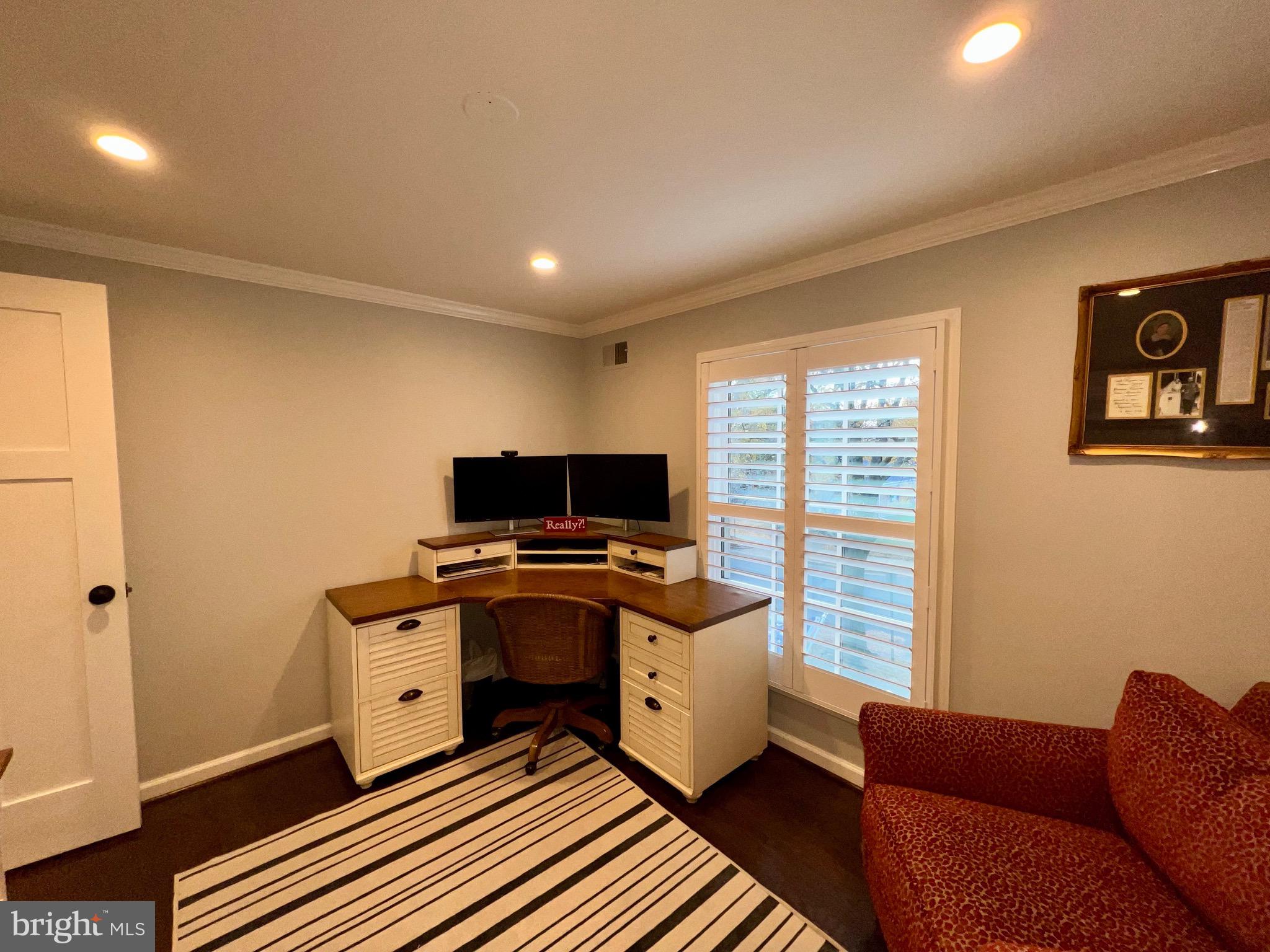 909 St Stephens Road Alexandria, VA 22304 - Photo 25 of 40 a living room with furniture and a flat screen tv