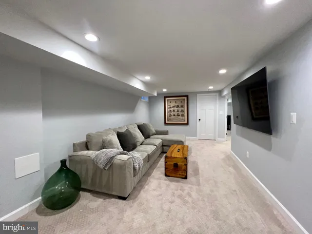 a bedroom with a bed and dresser