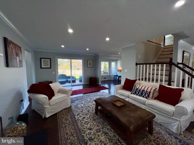 a living room with furniture and a couch