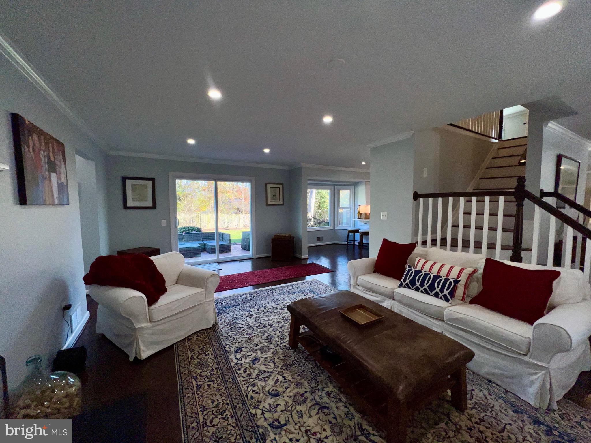 909 St Stephens Road Alexandria, VA 22304 - Photo 5 of 40 a living room with furniture and a couch
