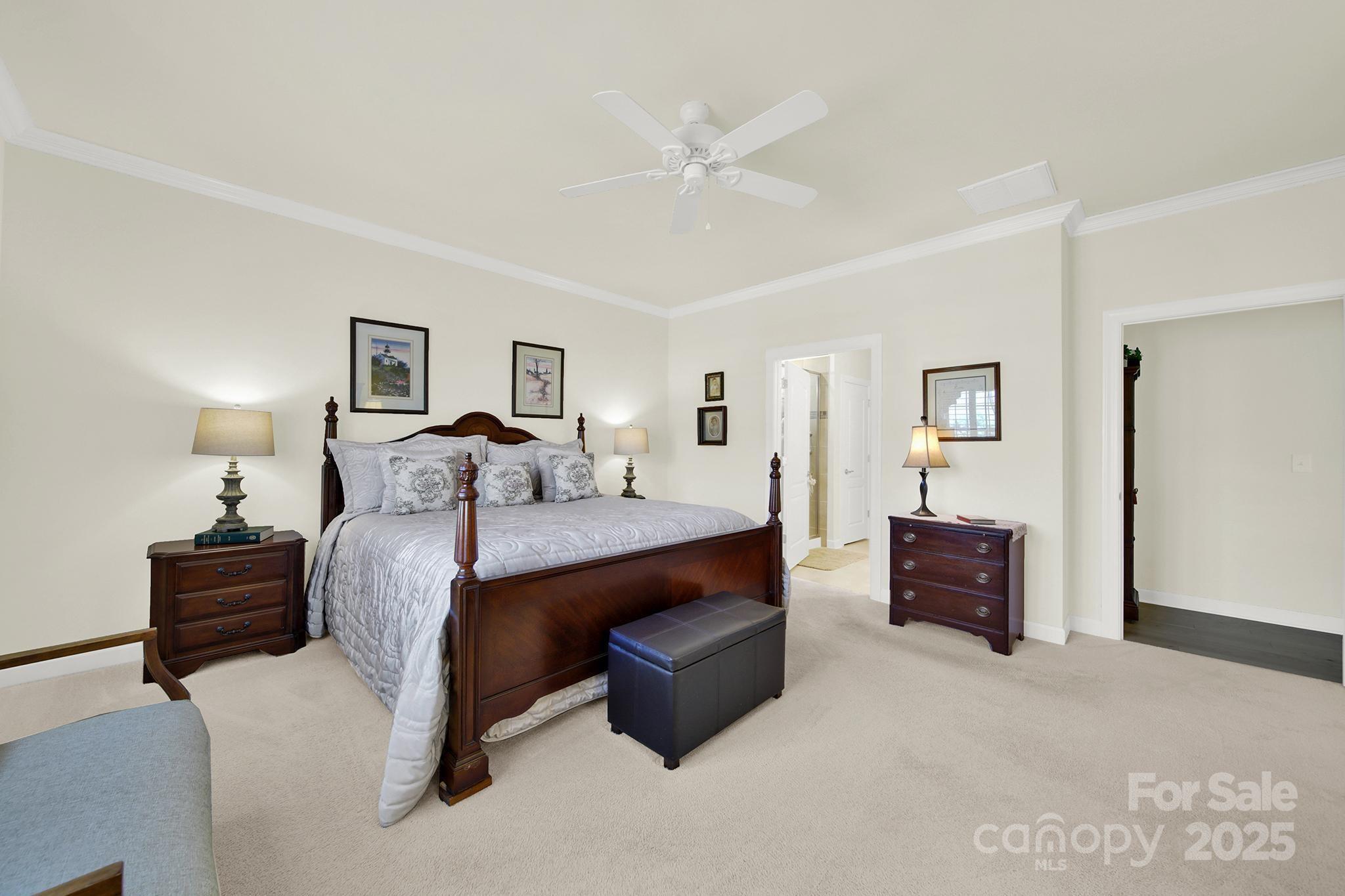 3097 Arches Bluff Circle Lancaster, SC 29720 - Photo 15 of 40 a bed room with a bed and dresser