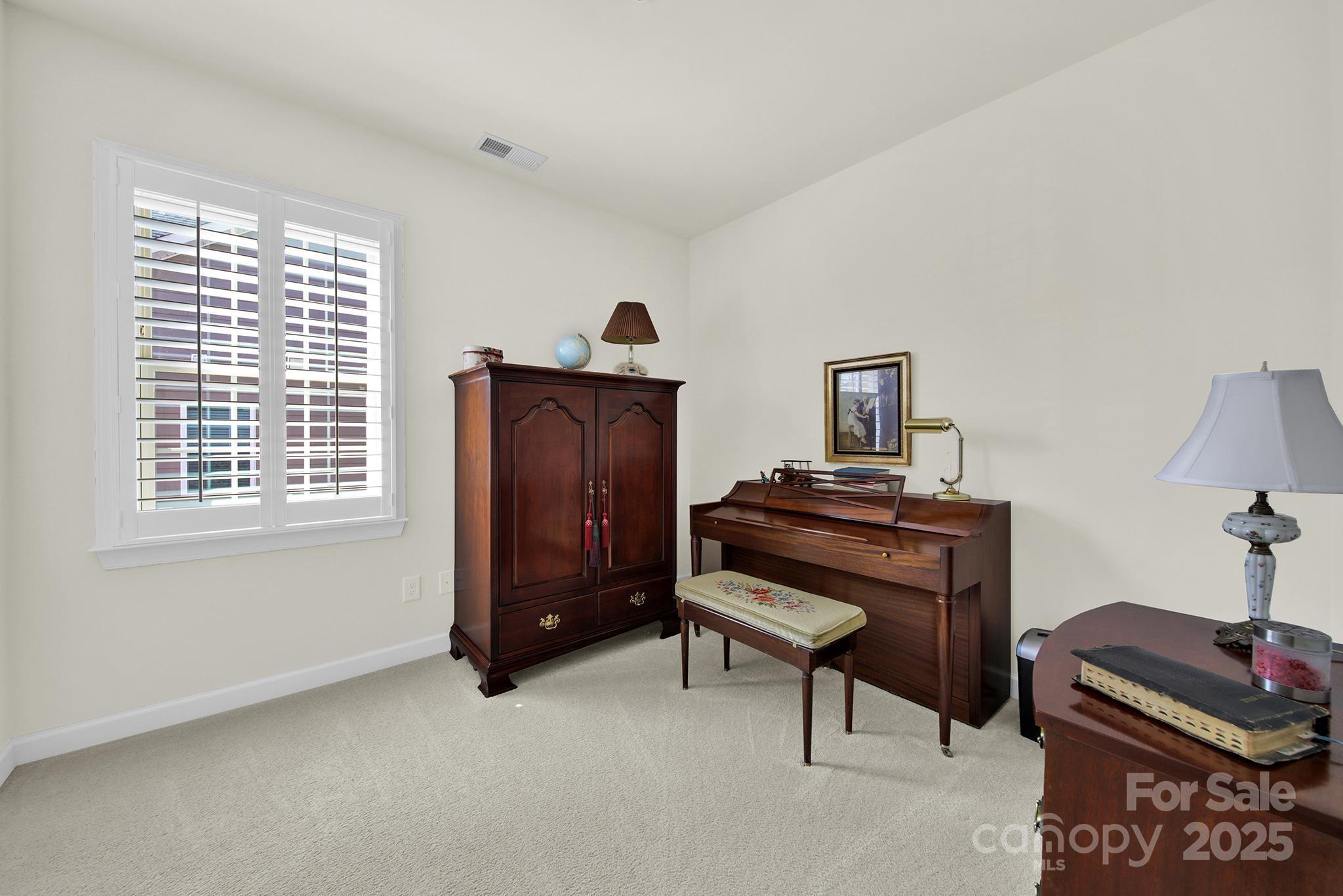 3097 Arches Bluff Circle Lancaster, SC 29720 - Photo 22 of 40 a room with furniture and a window