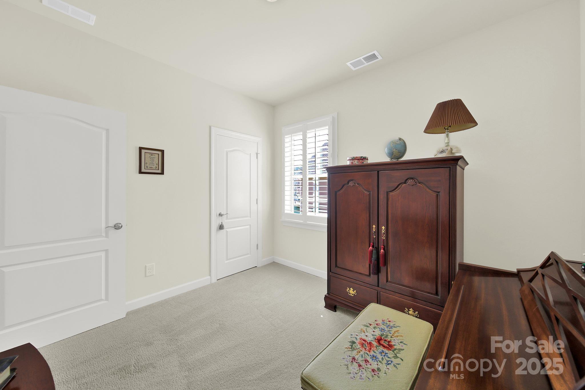 3097 Arches Bluff Circle Lancaster, SC 29720 - Photo 23 of 40 a view of room with furniture and wooden floor