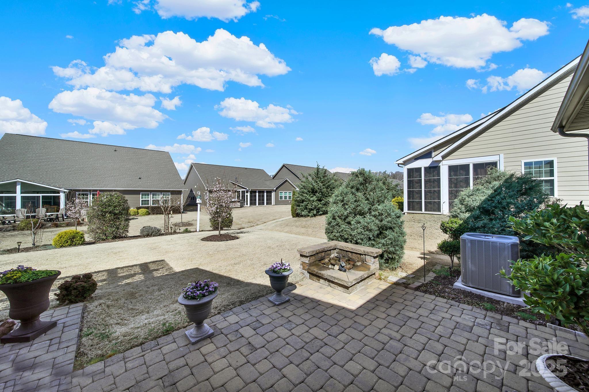 3097 Arches Bluff Circle Lancaster, SC 29720 - Photo 29 of 40 a view of a house with backyard and sitting area