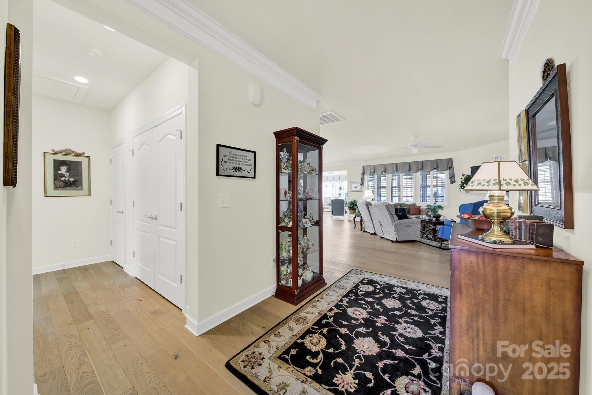 3097 Arches Bluff Circle Lancaster, SC 29720 - Photo 3 of 40 a view of a livingroom with wooden floor and furniture
