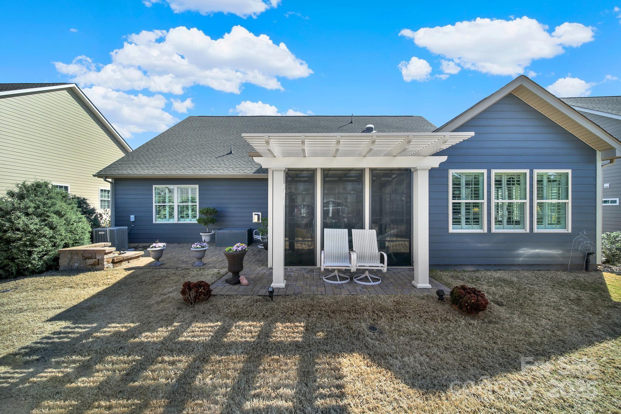 3097 Arches Bluff Circle Lancaster, SC 29720 - Photo 31 of 40 a front view of a house with garden
