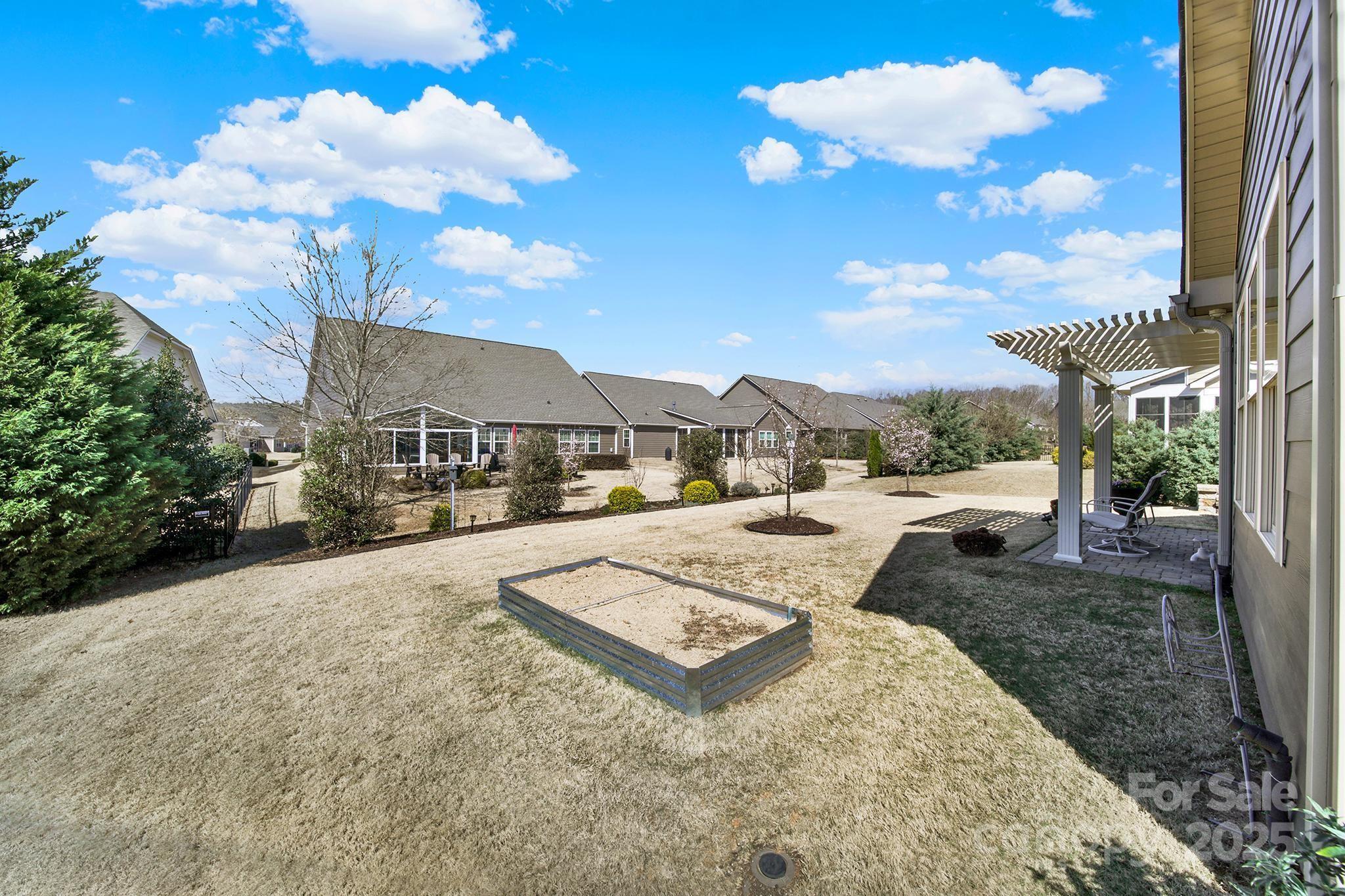 3097 Arches Bluff Circle Lancaster, SC 29720 - Photo 33 of 40 a view of a street with a building in the background