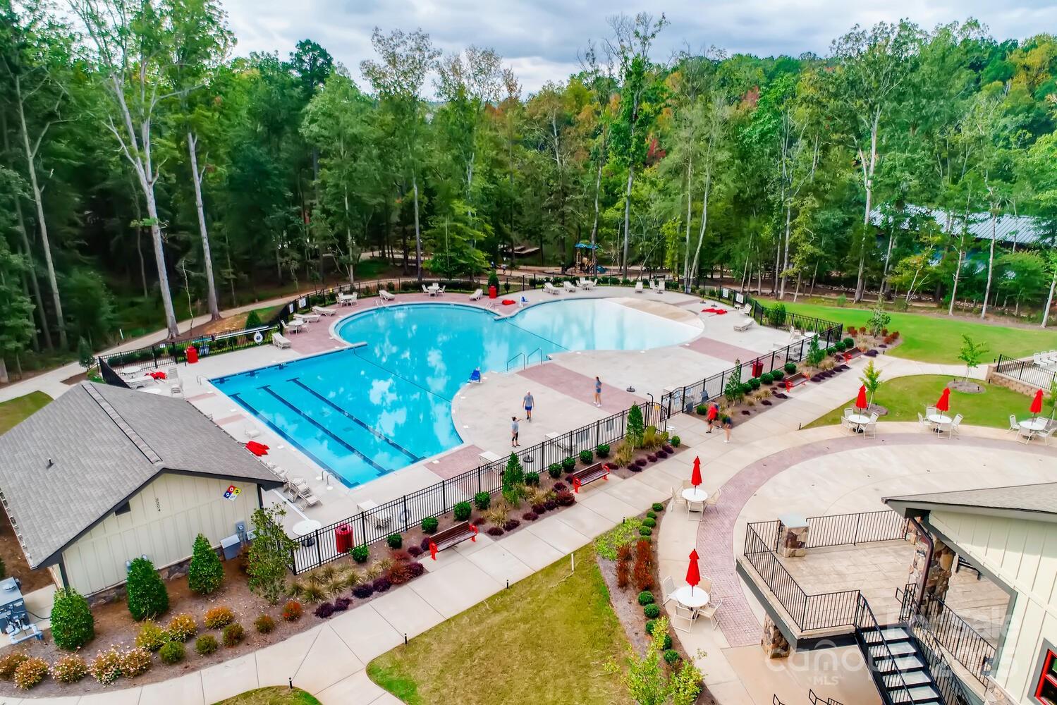 3097 Arches Bluff Circle Lancaster, SC 29720 - Photo 37 of 40 an aerial view of a tennis ground and large trees