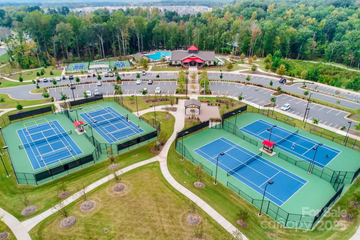 3097 Arches Bluff Circle Lancaster, SC 29720 - Photo 39 of 40 a view of a tennis ground with large trees